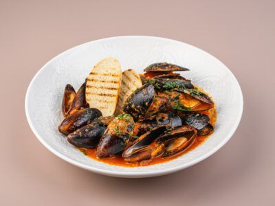 Мидии в томатном соусе